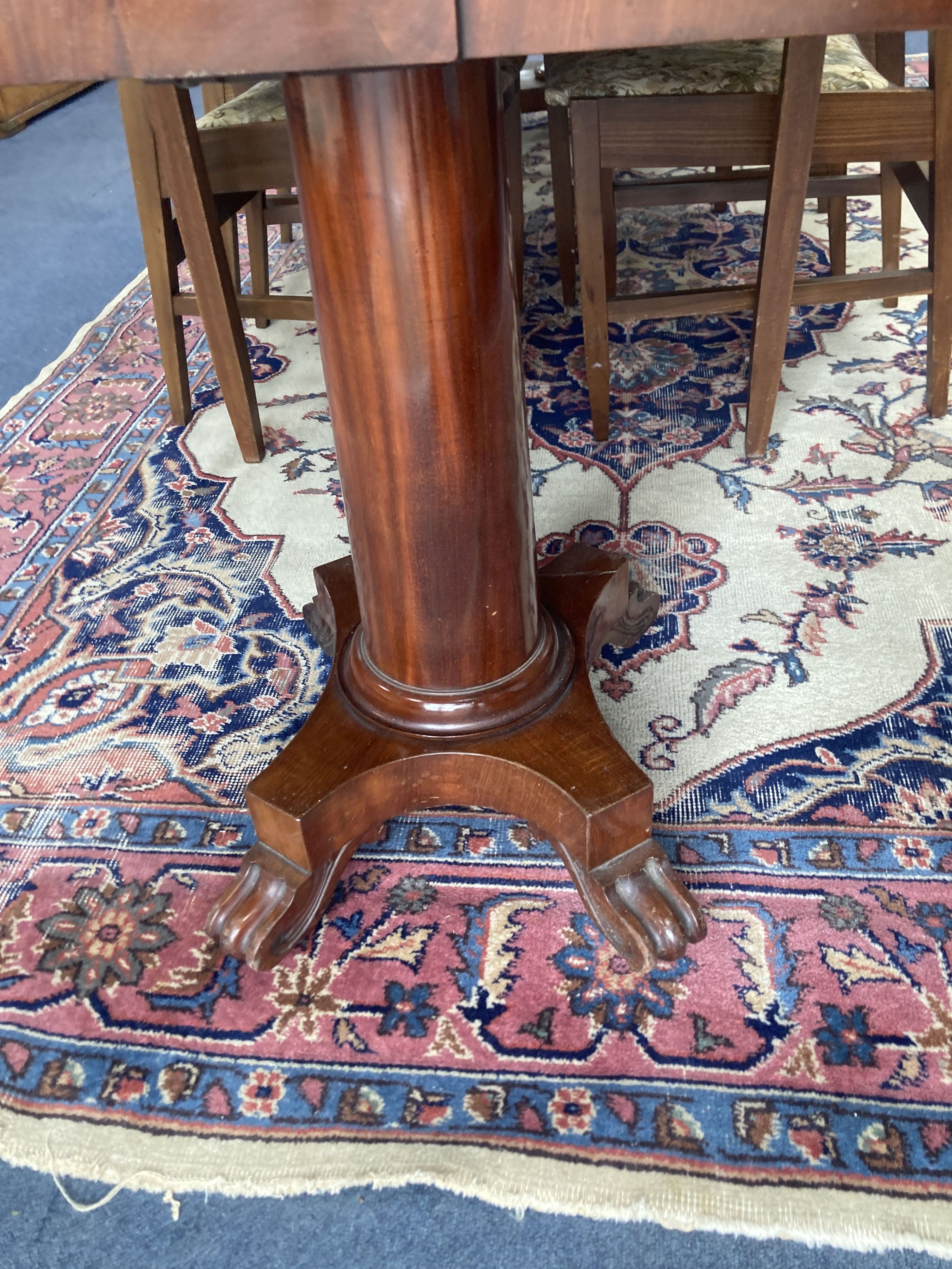 A Victorian mahogany folding card table in flamed veneers, 91cm diameter (91 x 45cm closed), 76cm high